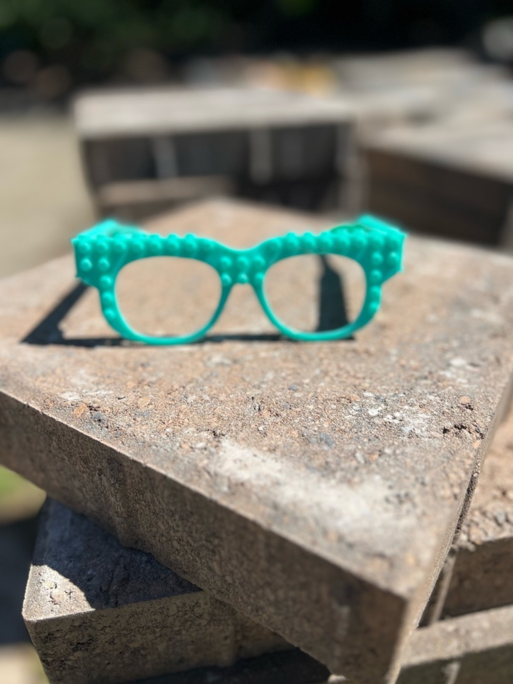 collectible teal LEGO-themed glasses 🤓